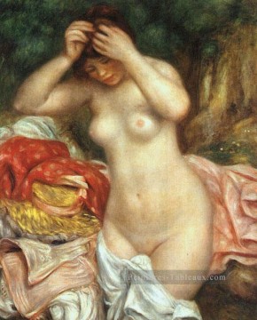  Arran Tableaux - Baigneuse arrangeant ses cheveux Pierre Auguste Renoir